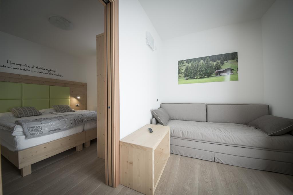 Aparthotel Dolomites Living&Relax Commezzadura Quarto foto