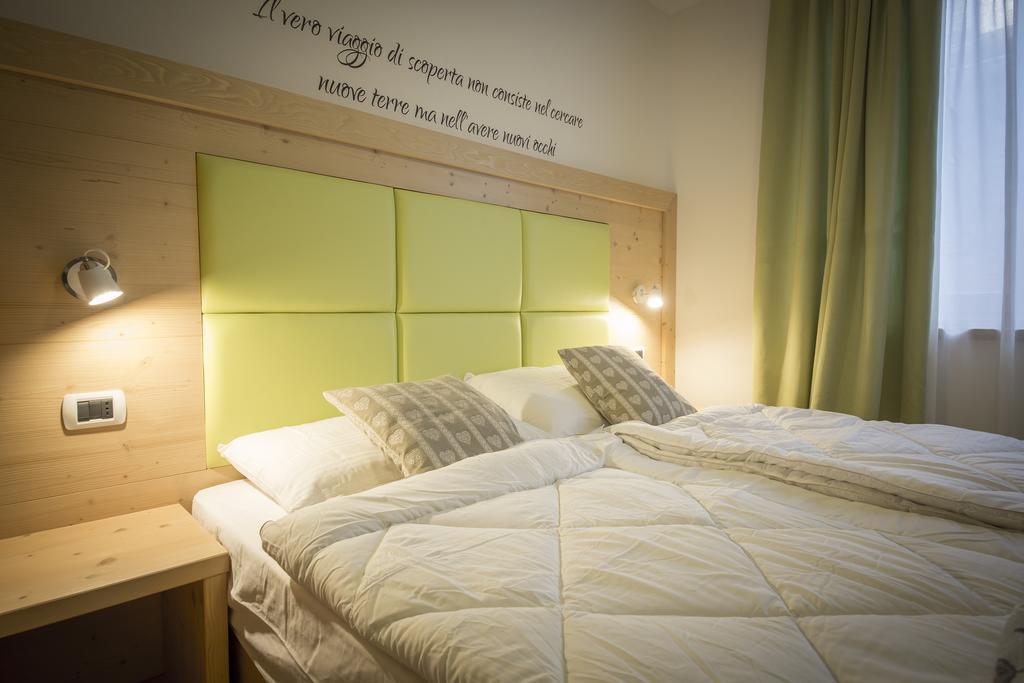 Aparthotel Dolomites Living&Relax Commezzadura Quarto foto